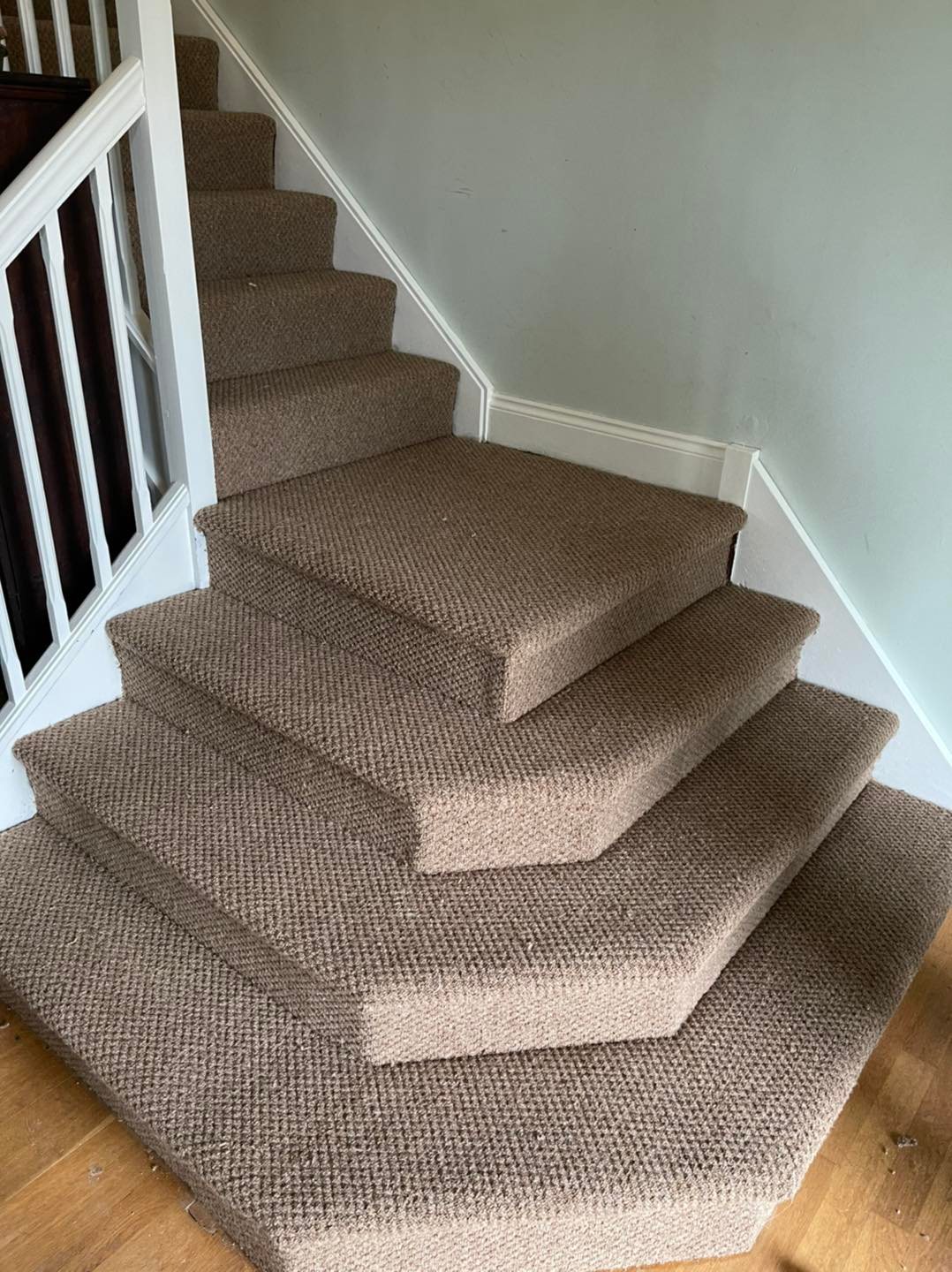 Carpet fitted on unusual shaped stairs by Lloyd's Carpets & Furnishings