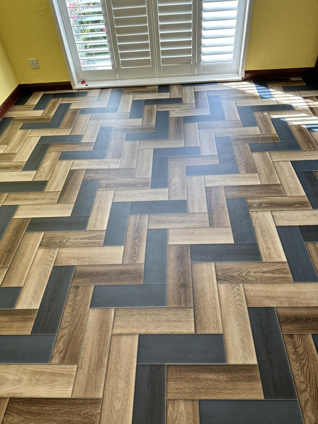Different coloured wood effect LVT flooring in Wigton